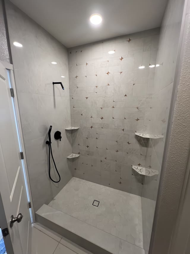 Completed tiled shower photographed from the doorway