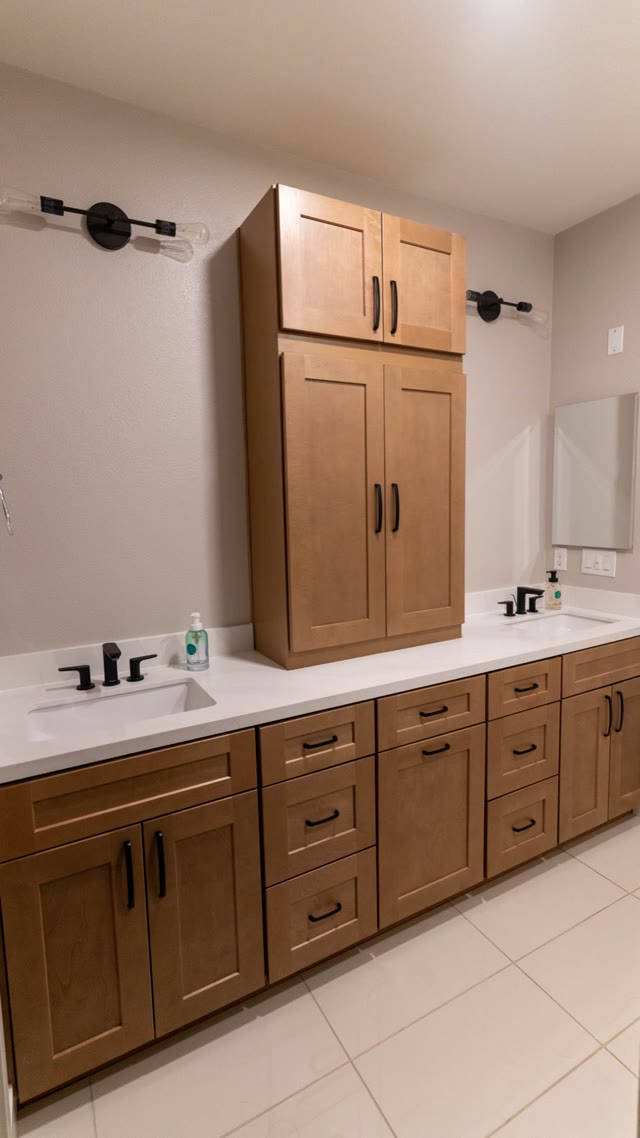 Finished double vanity and storage wall at Centre Point