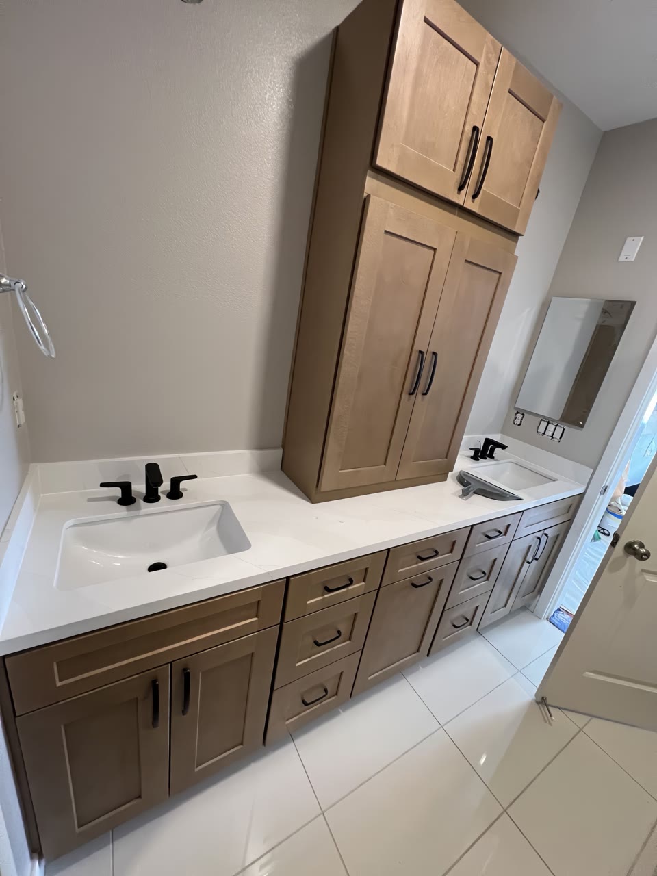 Finished vanity with drawers in the Centre Point bathroom