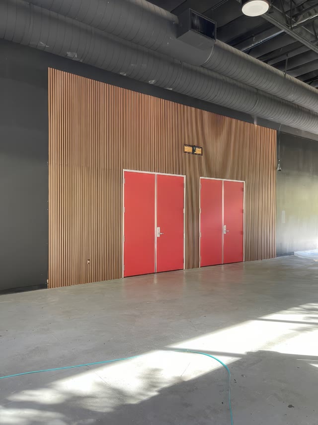 Interior slat wall detail in a youth space